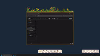 A full garden of flowers and cacti on top of a File Explorer window.